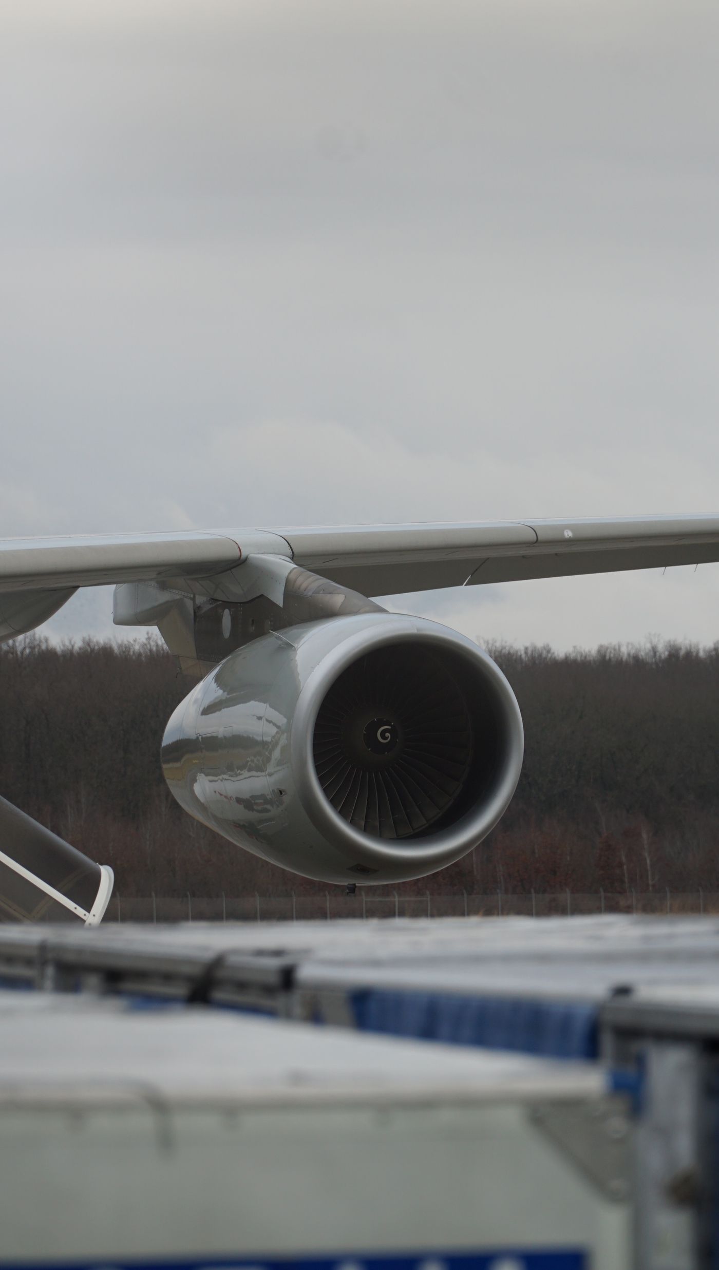 A jet engine mounted under an aircraft wing
